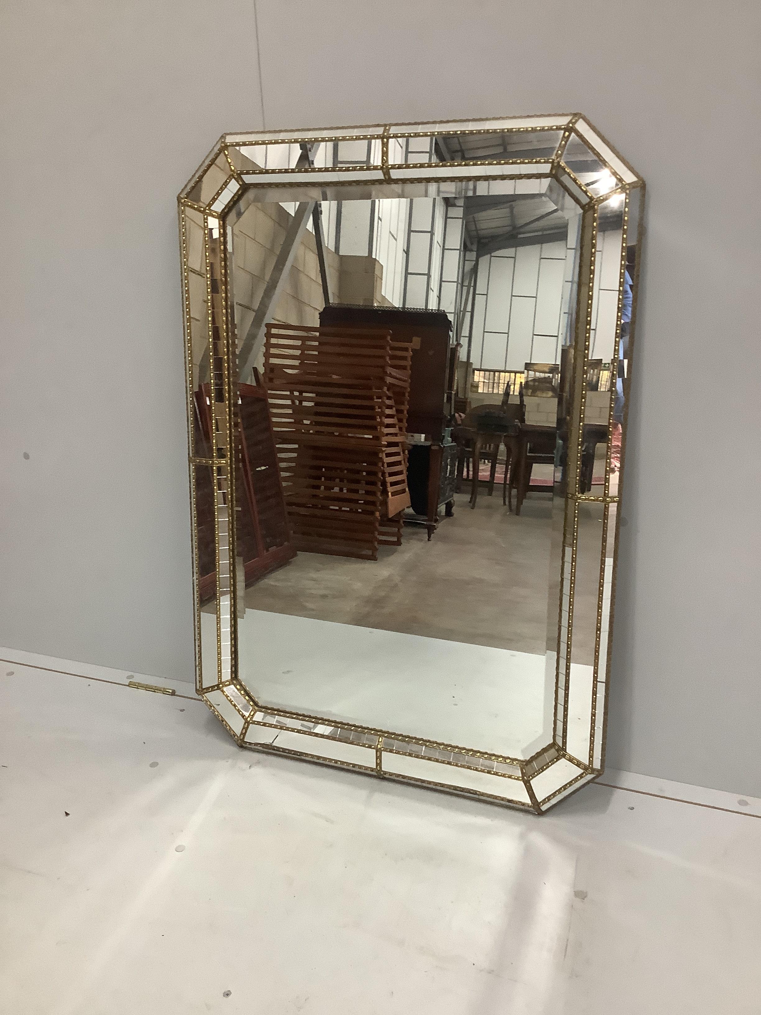 A Venetian style octagonal gilt metal mounted wall mirror, width 106cm, height 75cm
